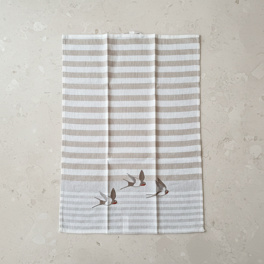 Sparrow tea towel overhead on stone